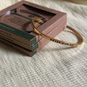 Mantraband - “Never Give Up”